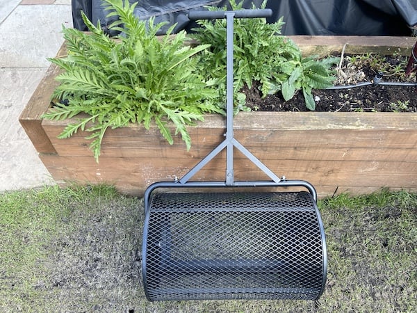 my Walensee 24-inch Compost Spreader I use to apply top dressing or compost as reseeding