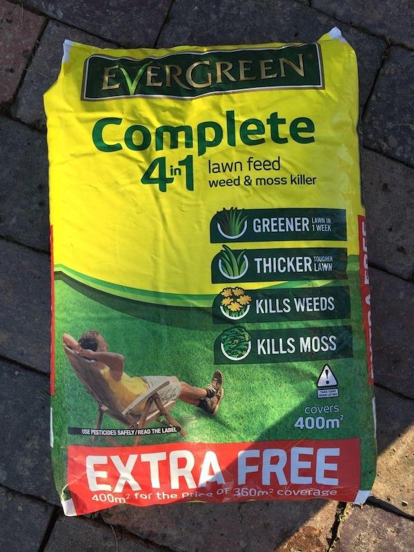 EverGreen Complete 4-in-1 Lawn Care Feed I apply with a lawn spreader