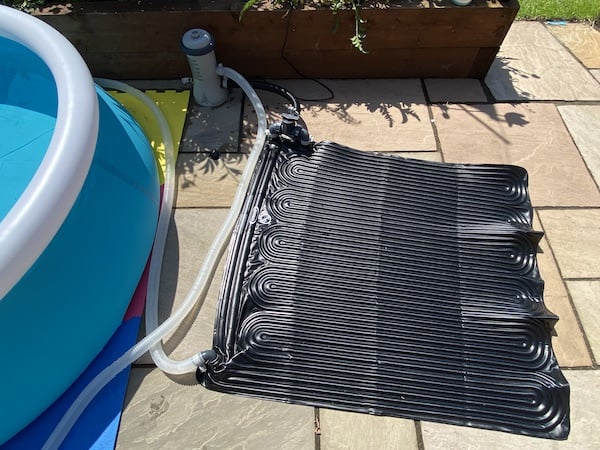My Intex Krystal Clear Swimming Pool Filter Pump connected with a solar heat mat