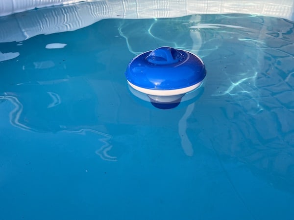 Surface dispenser I use to slowly add chlorine to the water to kill algae and stop the water turning green