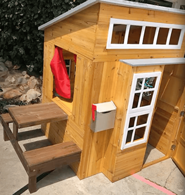 KidKraft 182 Wooden Outdoor Playhouse built in my garden